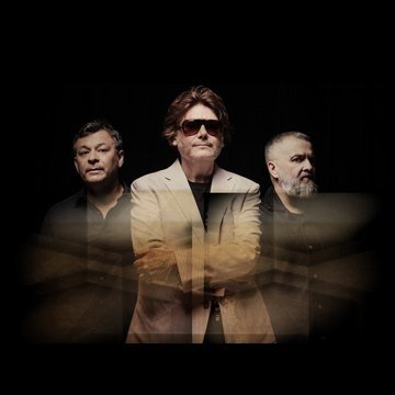 Imagem dos integrantes do Manic Street Preachers