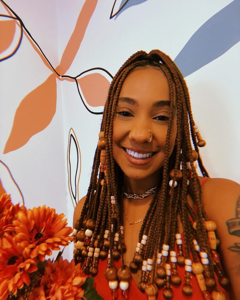 Imagem da cantora Mel Duarte